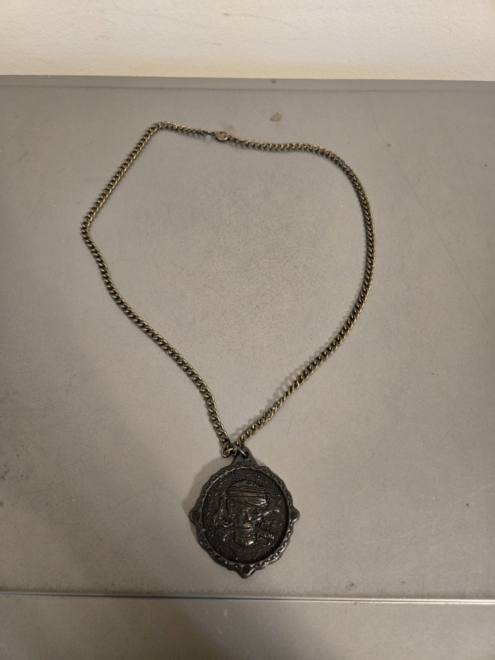 Disney Parks Pirates of the Caribbean Medallion The Pirates League Skull Pendant